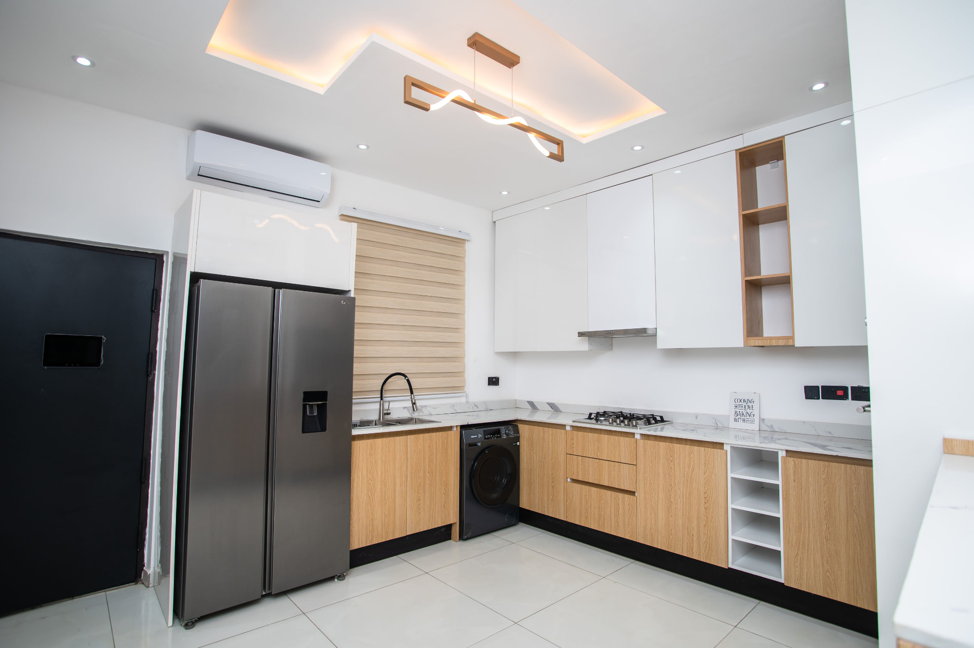 Fitted kitchen with marble worktops at Pryse Enclave