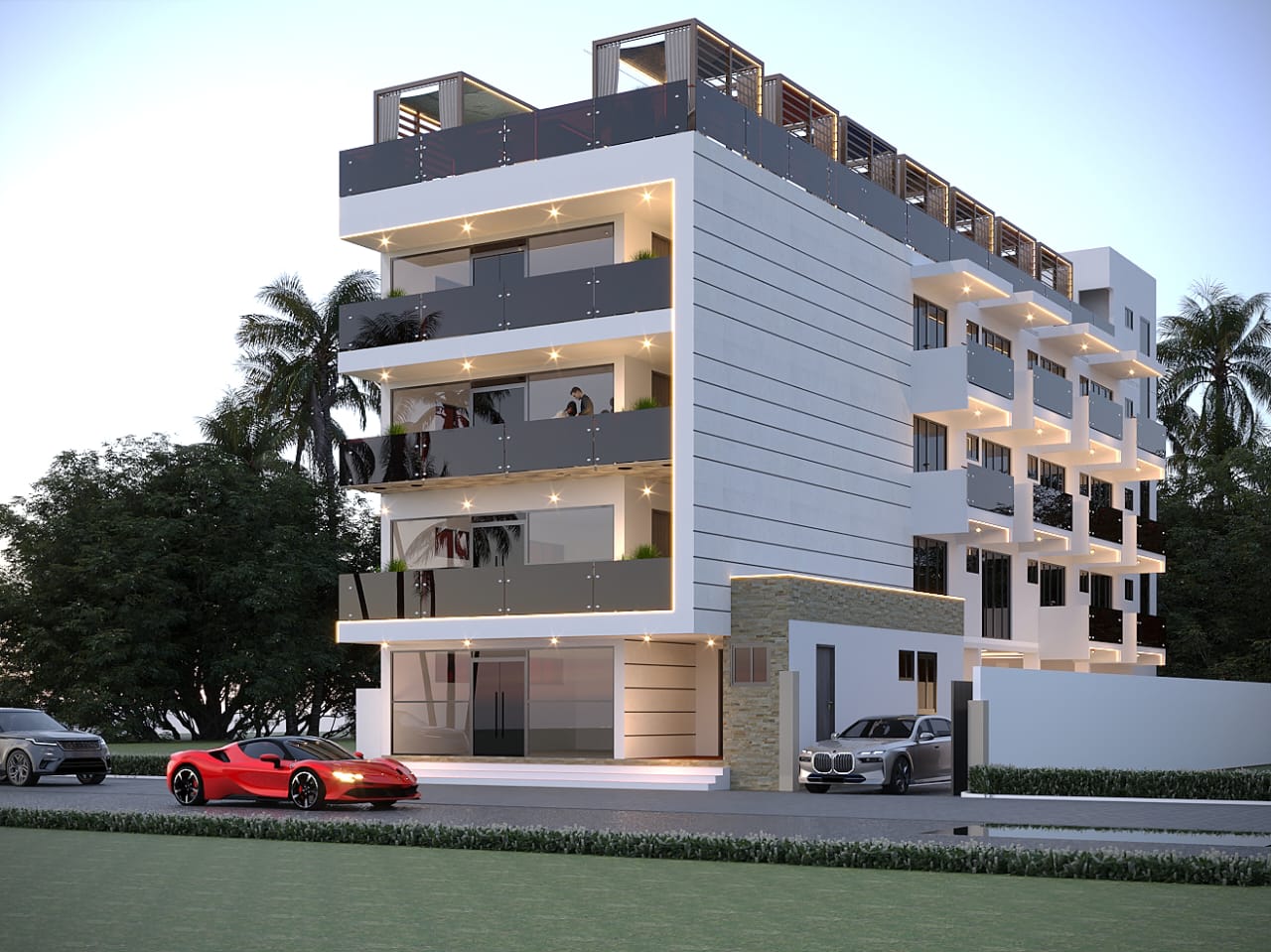 Balconied front elevation of Grandeur Luxe at dusk